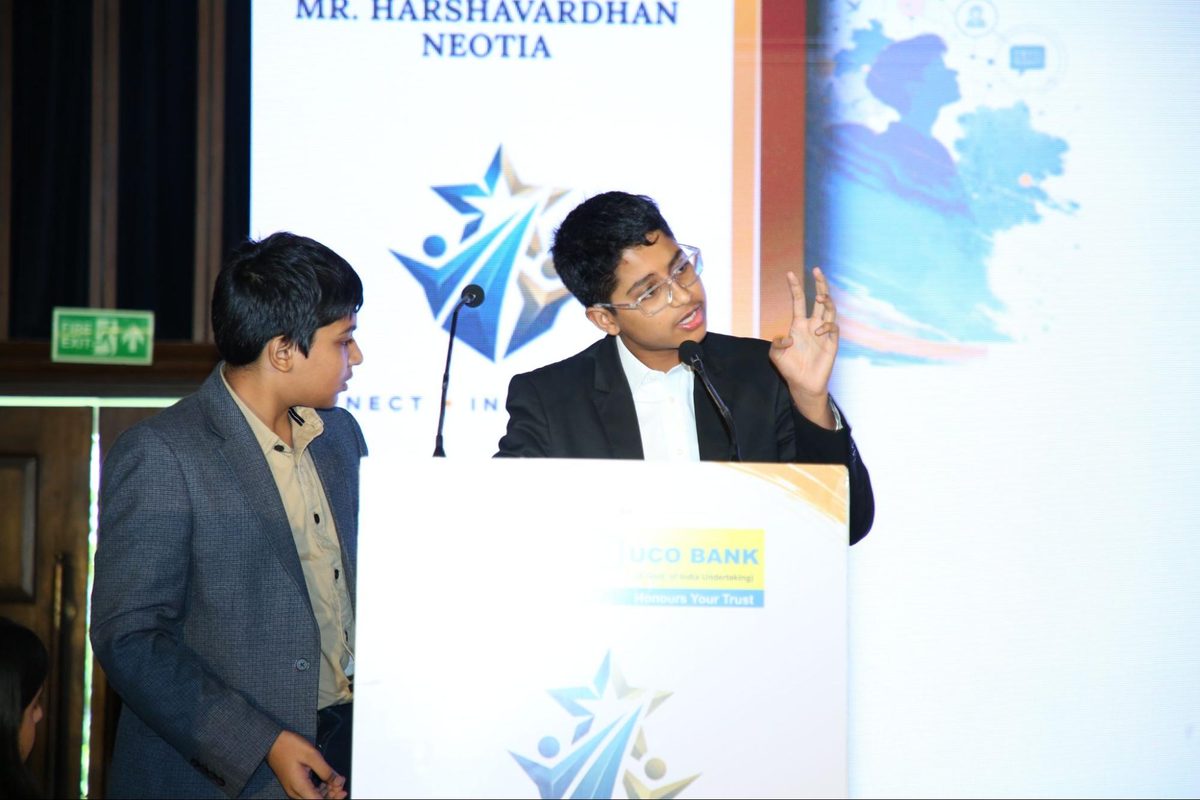 Two Health Support Provider presenters at the podium