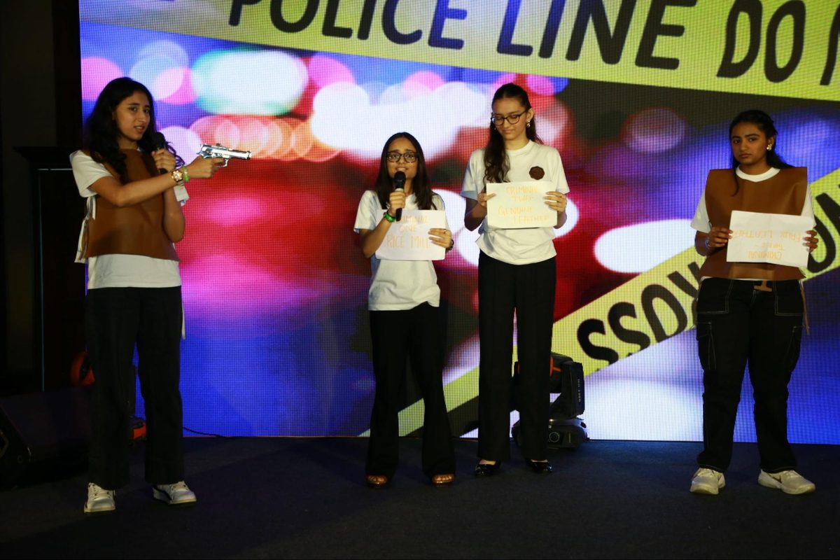 Huskell Co. team performing a crime-scene skit with the suspects rice mill, genuine leather and faux leather