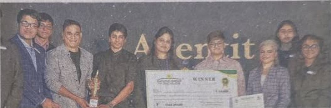 The AgentIt team with their trophy and winner's cheque